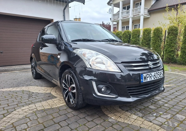 Suzuki Swift cena 34700 przebieg: 100200, rok produkcji 2015 z Żychlin małe 326